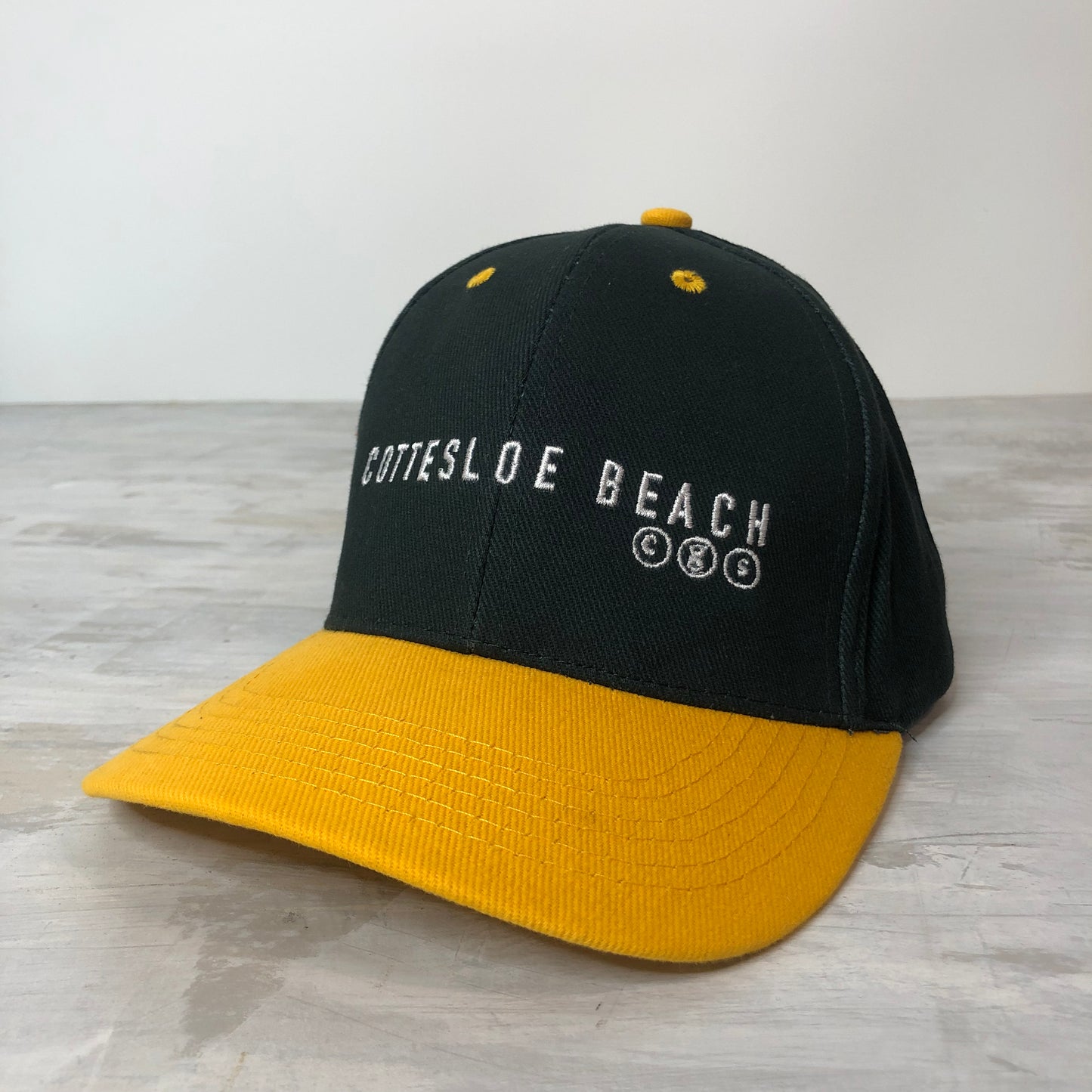 Gold/Green Cap