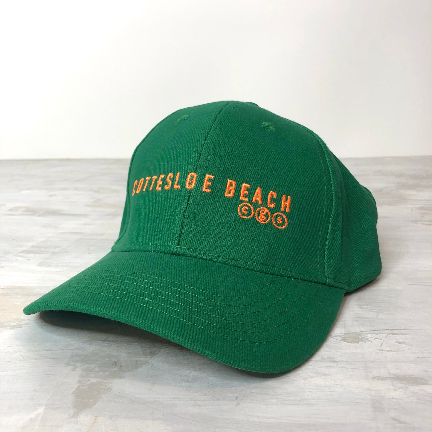 Emerald Green Cap -  Fleuro Orange Text